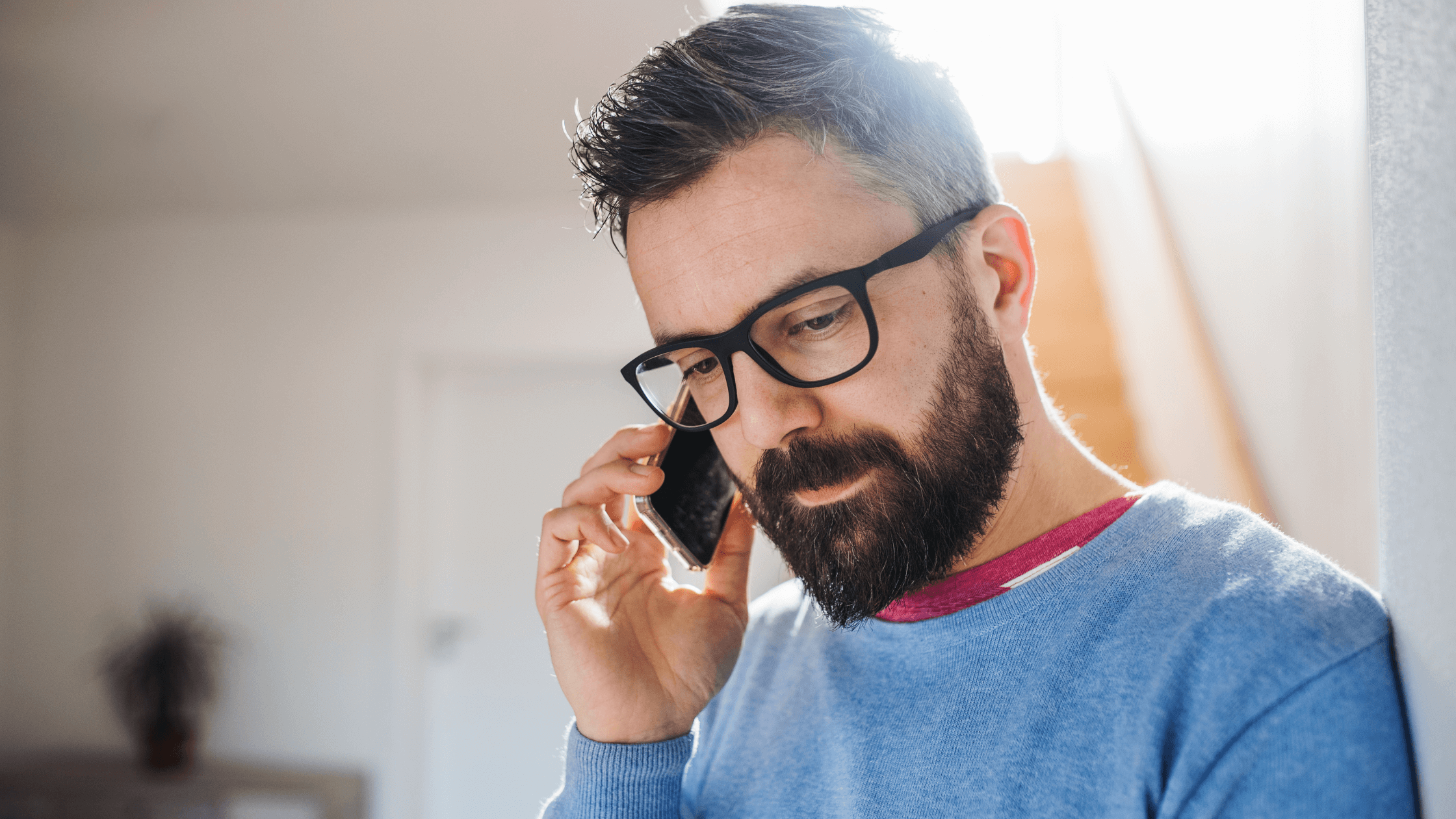 A man talking on his cell phone.