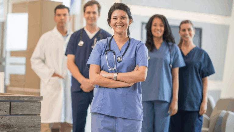 A team of nurses and doctors standing together